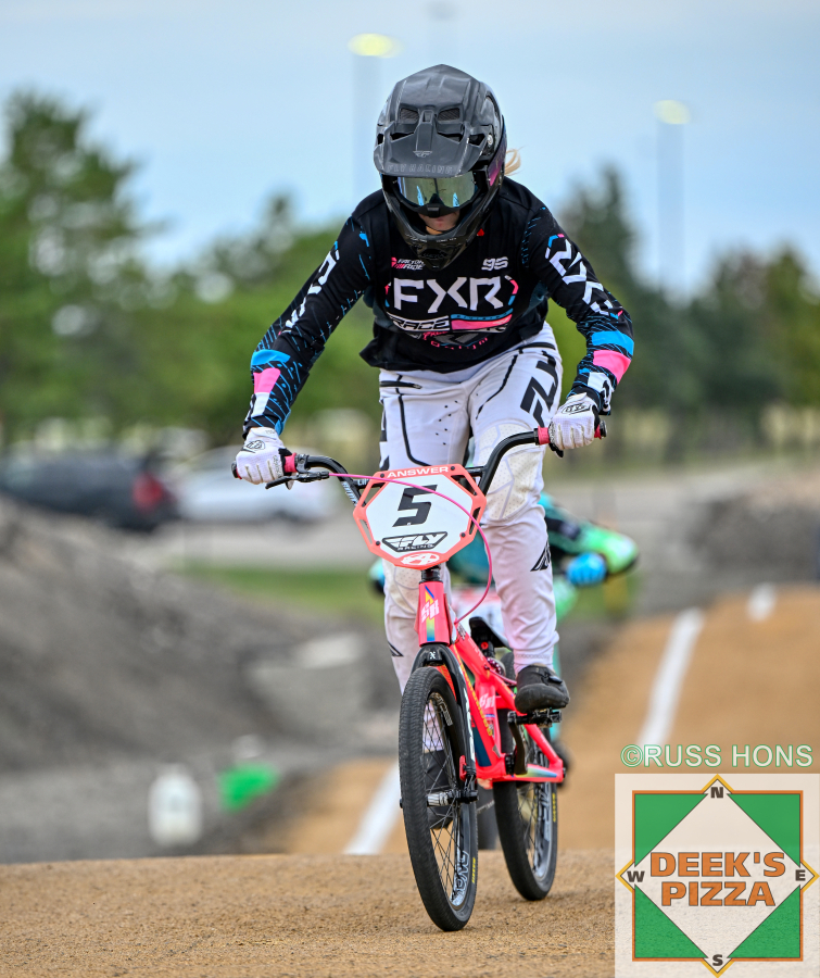 BMX rider racing at Hugo's Raceway