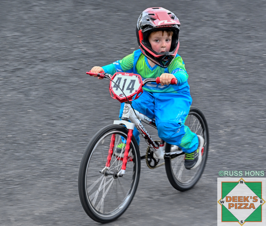 Young BMX rider racing at Hugo's Raceway
