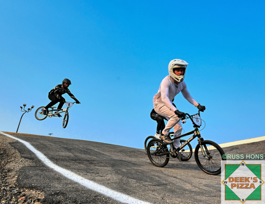 BMX riders on a berm at Hugo's Raceway