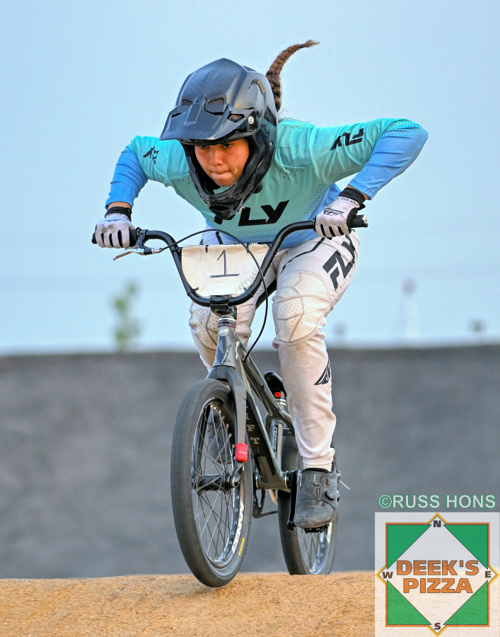 BMX rider racing at Hugo's Raceway