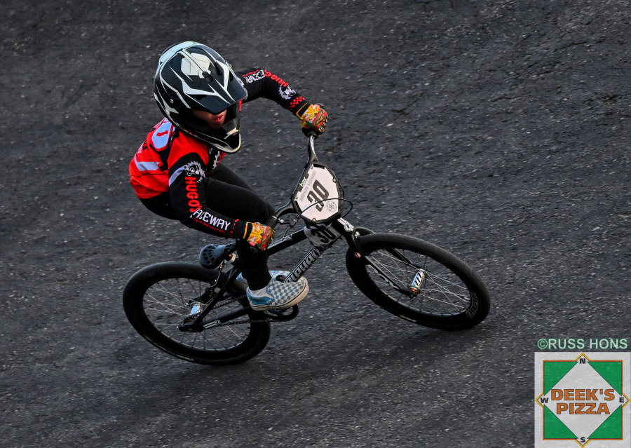 BMX rider cornering at Hugo's Raceway