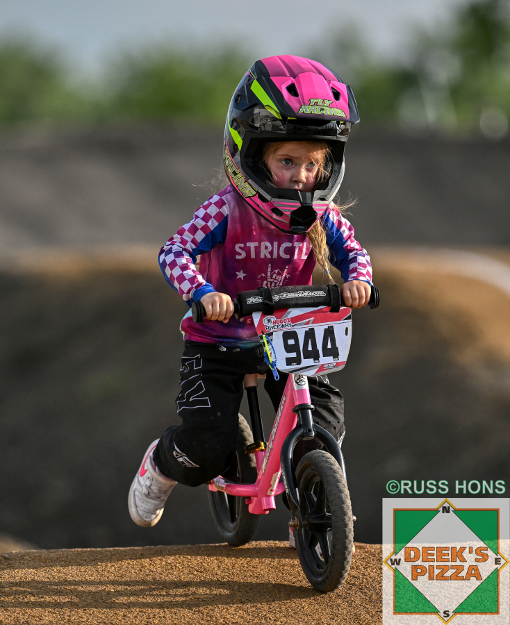 Young BMX rider racing at Hugo's Raceway