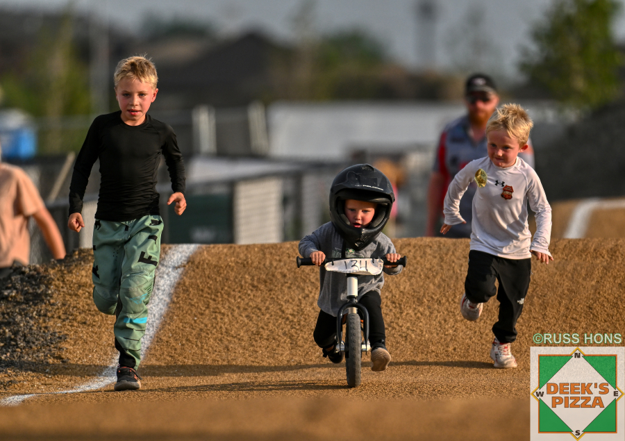 Young riders enjoying the BMX track